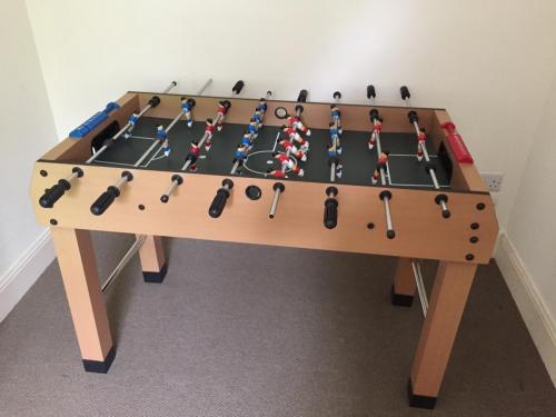 Table tennis table in games area